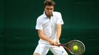 Simon progresses to last eight in Nice
