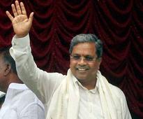 Siddaramaiah inducts 28 Ministers, largely keeps tainted away