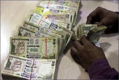 Rupee ends flat; down 1 paisa Vs dollar at 54.52