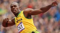 Bolt narrowly wins first 100m of 2013