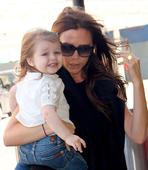 Beaming Harper Beckham heads to Paris for dad's birthday