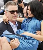 Get a room! Alec Baldwin enjoys smooch with pregnant wife Hilaria Thomas at Cannes