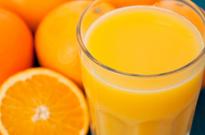 Orange juice seen falling as rains improve growing conditions
