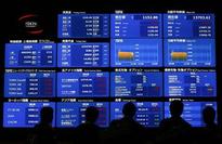 Asian stocks spurred higher by U.S. data; Aussie falters