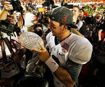 Alabama's broken BCS title trophy auctioned off