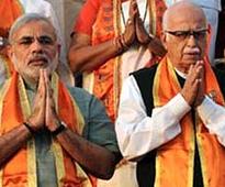 BJP's peace-keeping mission: Modi meets Advani