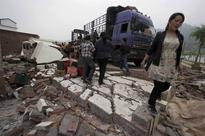 Portable ATMs, phone-charging in China quake zone