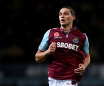 Hammers turn to Carroll after completing Rat signing