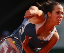Lucky loser Keys surprises Li Na in Madrid