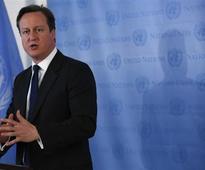 UK's Cameron committed to ruling in coalition until 2015 - spokesman