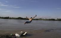 Rebel soldier's moment of relaxation away from Syria's front line
