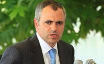 Omar asks Kashmiris to take cue from Pakistan voters
