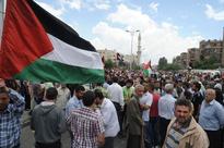 Terrorists Open Fire on Palestinians Marching Back to Their Houses in Yarmouk Camp
