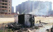 Guards open fire at protesting workers in Noida, 2 injured