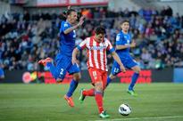 Nine-man Atletico held to draw at Getafe