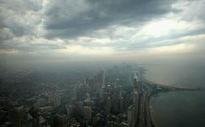Violent storm sweeps across upper Midwest, transport chaos in Chicago