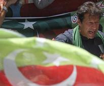 Imran Khan's party wins revote in Karachi, protests expected