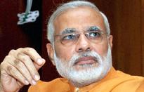 Narendra Modi meets party patriarch L.K. Advani at his residence