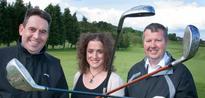 Golfers brave wet weather for charity golf day