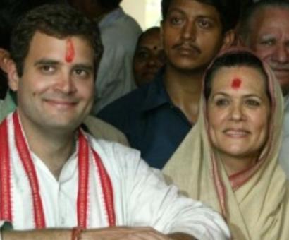 We ALL stand by Dr Singh, says Sonia, Rahul