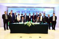 COFCO, Danone, Mengniu to boost development of dairy products in China
