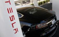 Tesla's Musk Channels Chrysler's Iacocca With Hastened U.S. Reimbursement