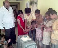 Photos: Prem Kumar adopts two children on his 37th birthday