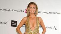 Heidi Klum goes commando, takes tumble
