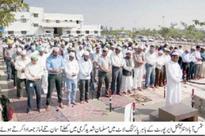 Muslims offer prayer under ...