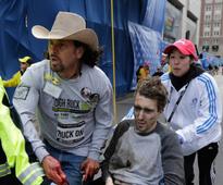 Cowboy-hat hero meets with bomb victim he rescued