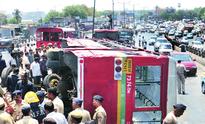 BEST bus turns turtle as BMC dumper rams into it, 19 hurt