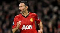 Giggs revels in title No.13