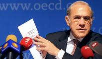 OECD revises eurozone growth outlook as Europe poses threat to global economy