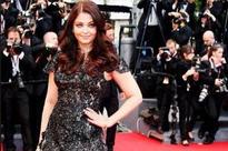 Aishwarya stuns in flowy Elie Saab gown, saree at Cannes