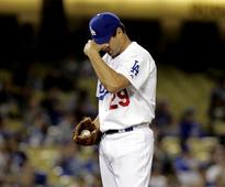 Rockies blitz Dodgers early and don't let up in 12-2 win