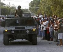 Besieged Mexican town cheers arrival of soldiers