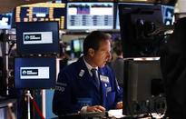 Wall Street ends flat on correction worries