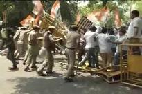 Congress workers protest outside BJP headquarters in Delhi