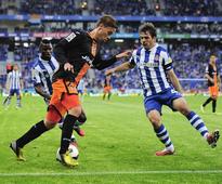 Valencia denied in six-goal thriller