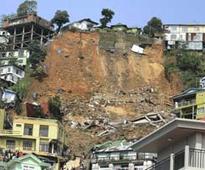 Landslide toll at 13, more bodies left