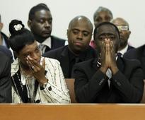 NY judge throws out indictment in case of officer charged in fatal shooting of unarmed man