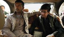 Wrecked cars reborn on Afghanistan's dusty streets