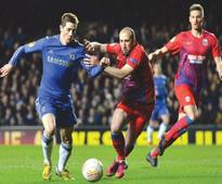 Spurs survive Inter scare as Torres saves Chelsea